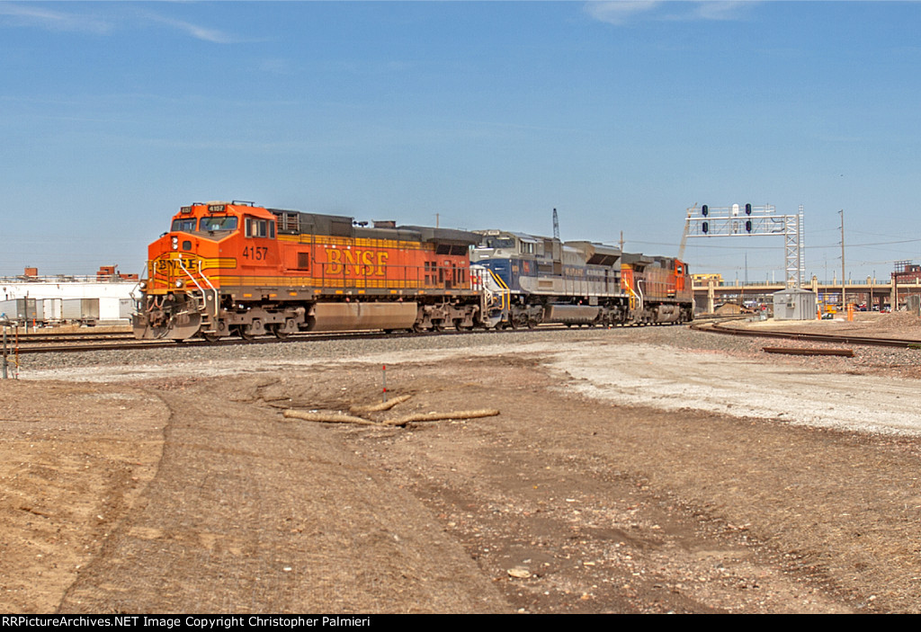 BNSF 4157, NS 1070, and BNSF 4666 Head West